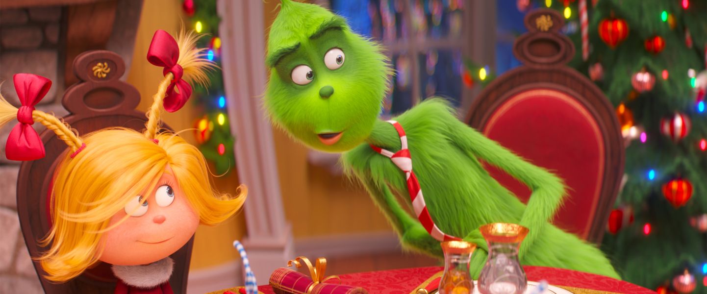 FILE - This file image released by Universal Pictures shows the characters Cindy-Lou Who, voiced by Cameron Seely, left, and Grinch, voiced by Benedict Cumberbatch, in a scene from "The Grinch." ‚ÄúDr. Seuss‚Äô The Grinch‚Äù made off with $66 million for Universal Pictures to top the weekend North American box office, according to studio estimates Sunday, Nov 11, 2018. (Universal Pictures via AP, File)