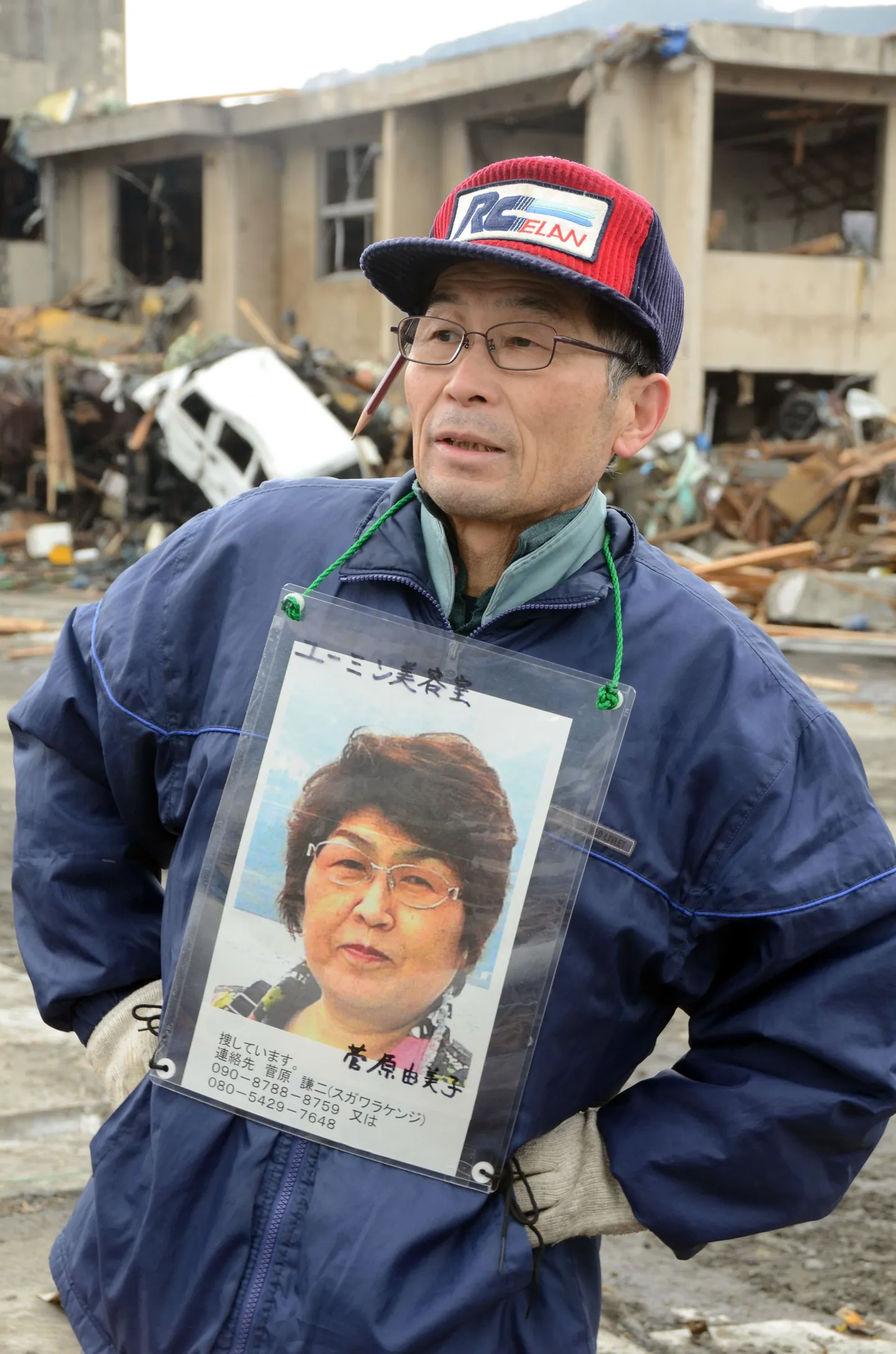 Kenji Sugawara oma naise fotoga