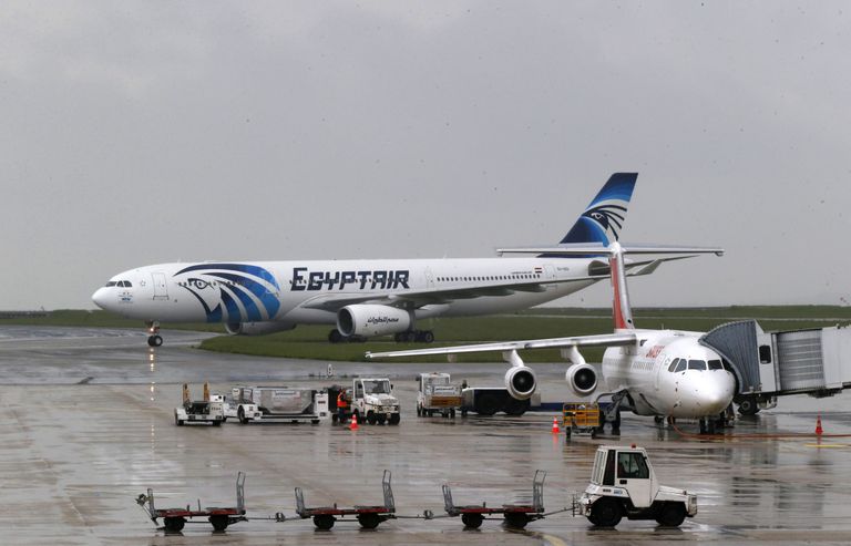 An EgyptAir Airbus A330-300 coming from Cairo rolls on the tarmac at Charles de Gaulle Airport outside of Paris, Thursday, May 19, 2016. An EgyptAir flight from Paris to Cairo with 66 passengers and crew on board crashed in the Mediterranean Sea early Thursday morning off the Greek island of Crete, Egyptian and Greek officials said. (AP Photo/Michel Euler)