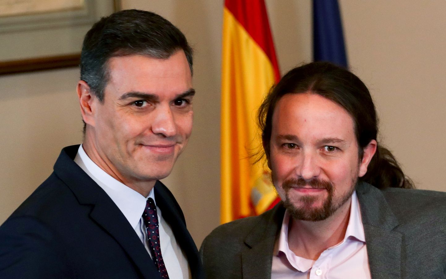 Hispaania sotsialistide liider ja peaministri kohusetäitja Pedro Sánchez ning erakonna Podemos juht Pablo Iglesias.