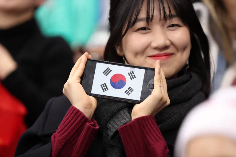 Lõuna-Korea fännid lühiraja kiiruisutamise võistlusel.