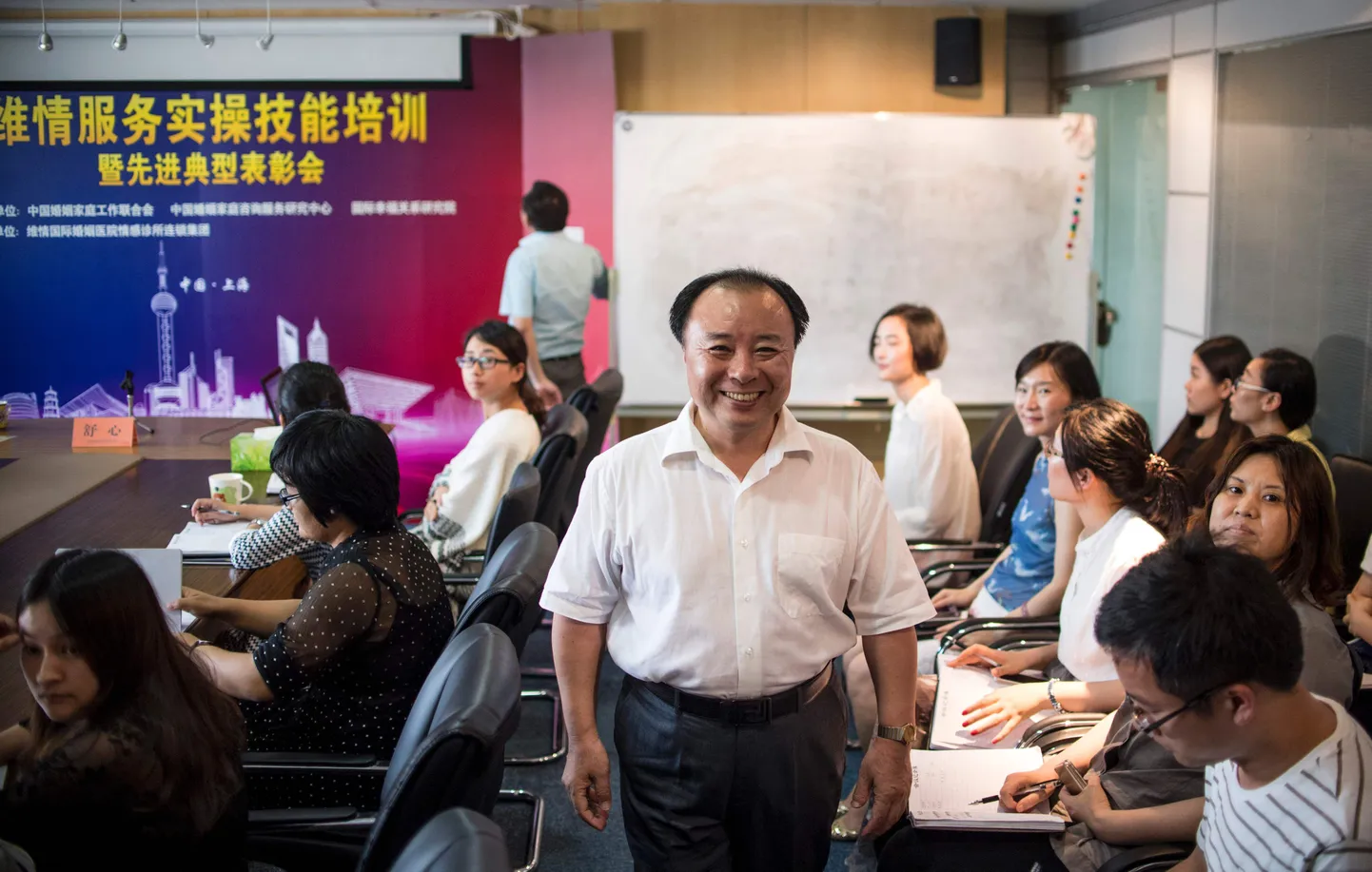 Armukeseküttimisega tegeleva firma Weiqing juht Shu Xin ettevõtte Pekingi kontoris.