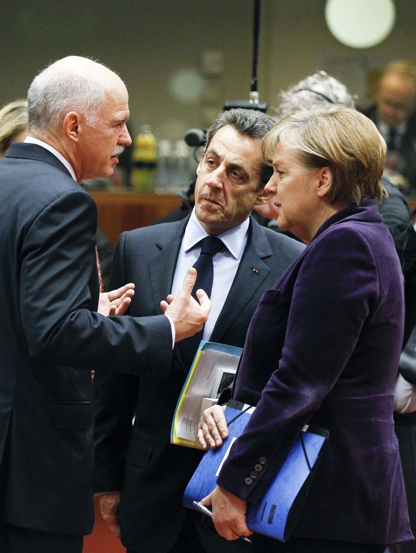 Kreeka peaministri George Papandreou, Prantsuse president Nicolas Sarkozy ja Saksa kantsler Angela Merkel