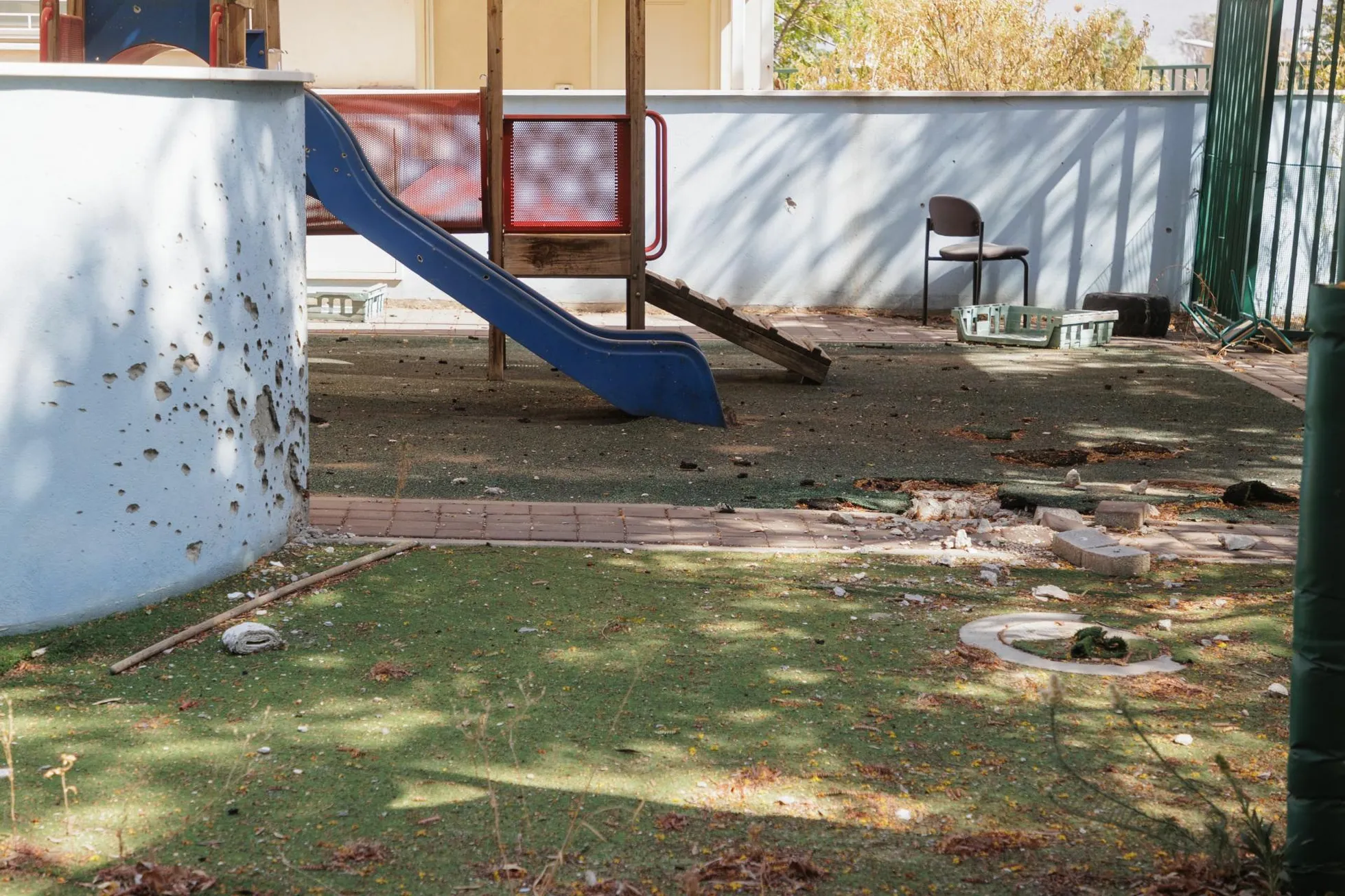 The traces of missile strikes are visible at the kindergarten in Kiryat Shmona.