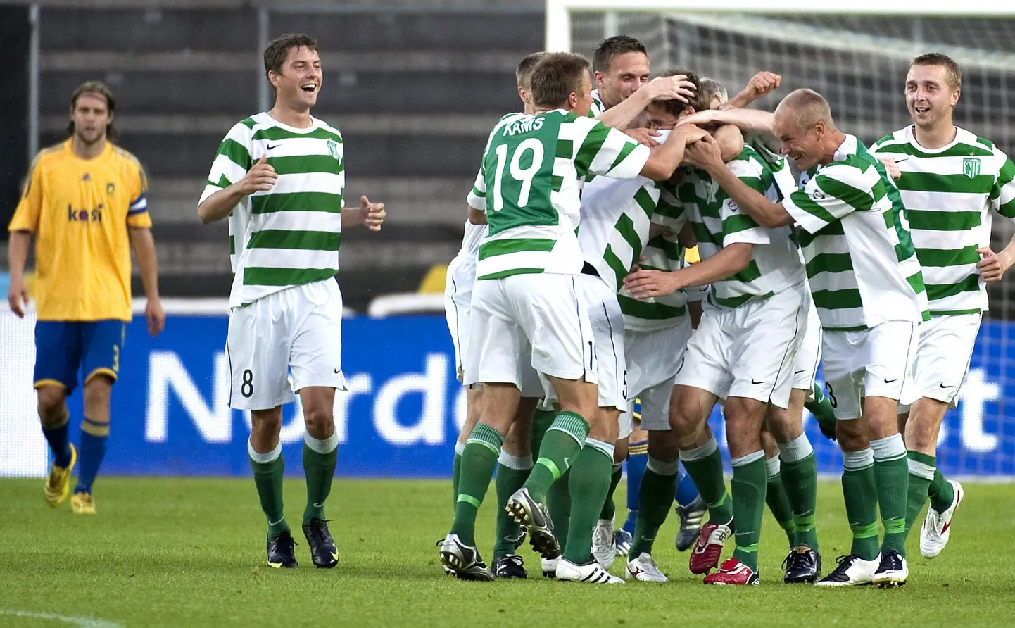 Flora Tallinn's players celebrate Tonis Vanna's goal during the UEFA Europa League qualifying football match against Brondby on July 16, 2009 in Copenhagen, Denmark. Flora Tallinn won the match 1-0. AFP PHOTO / Casper Christoffersen/SCANPIX DANMARK 2009)