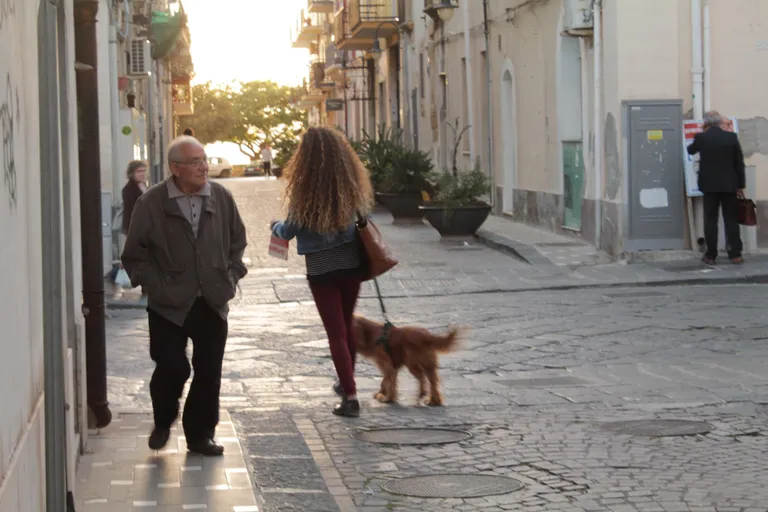 Downtown Augusta, one beholds few migrants as most of these head North. The poorest region of Italy, they have little to offer the immigrants...