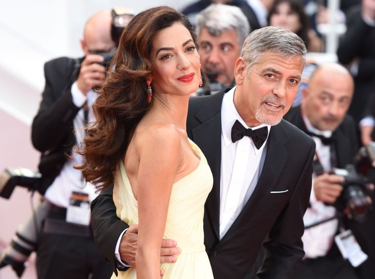 George ja Amal Clooney Cannes´is punasel vaibal / Scanpix