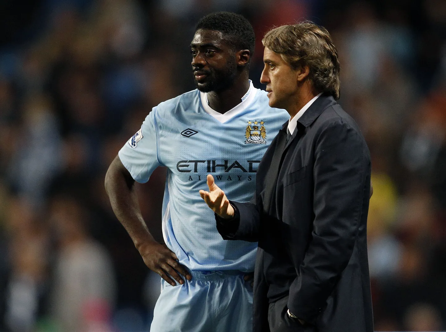 Kolo Toure (vasakul) ja Manchester City peatreener Roberto Mancini