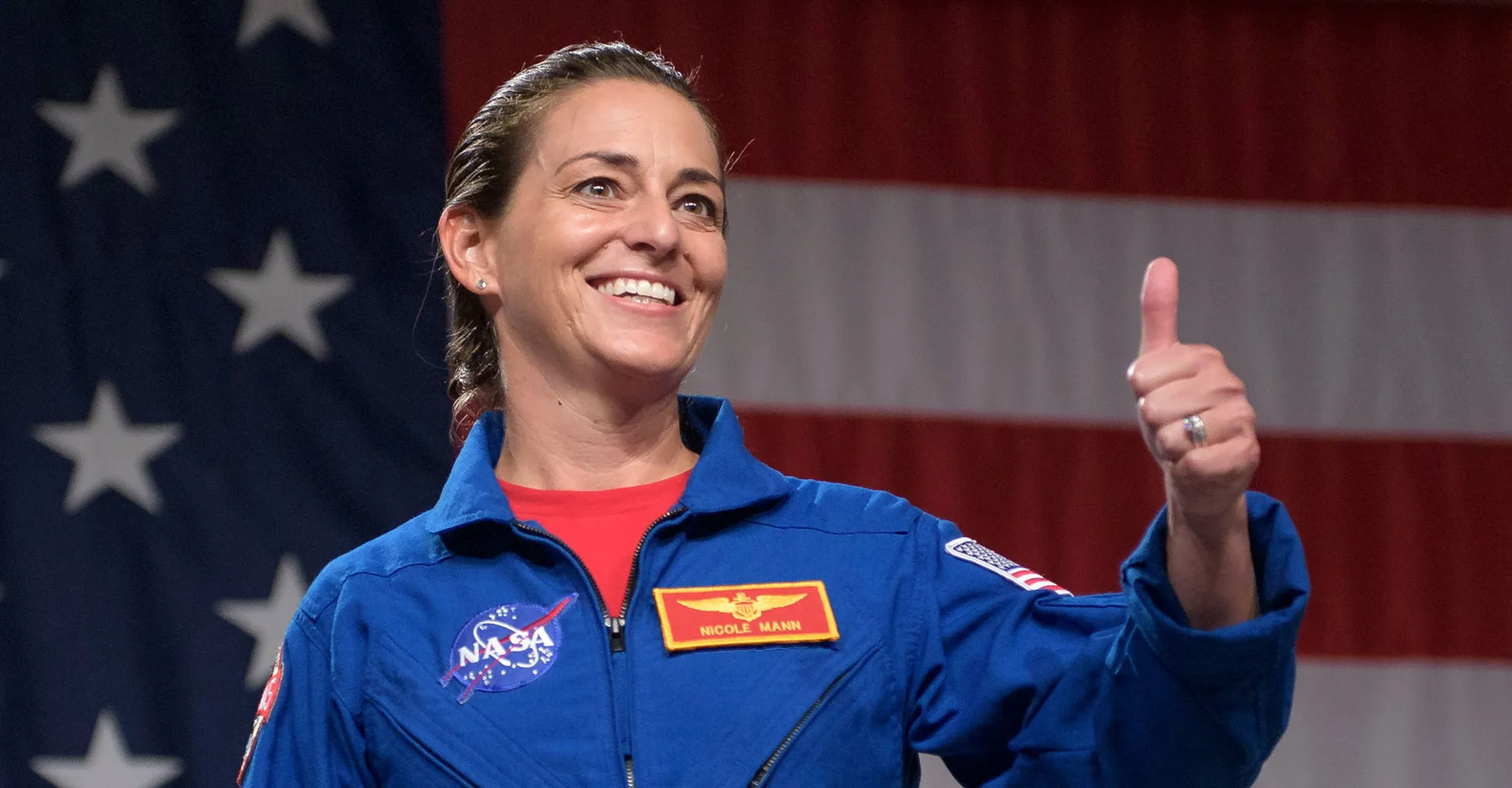 Nicole Aunapu Mann 2018. aasta augustis NASA üritusel, mil avalikustati Starlineri meeskond.