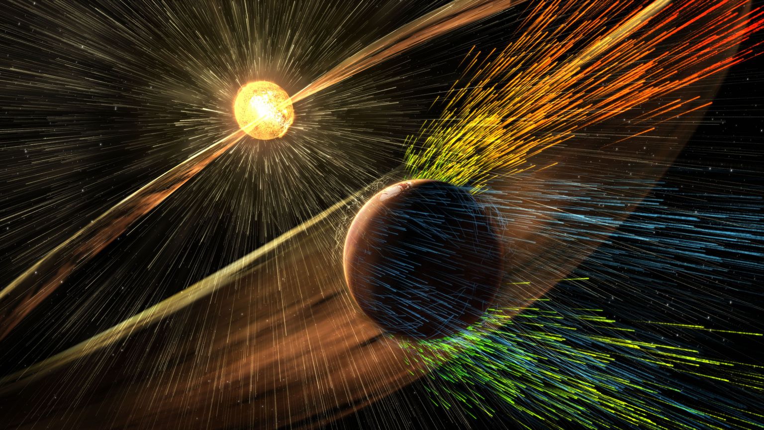 NASA kunstniku arvutijoonistus päikesetuulest ja Marsi atmosfääri osakeste kadumisest