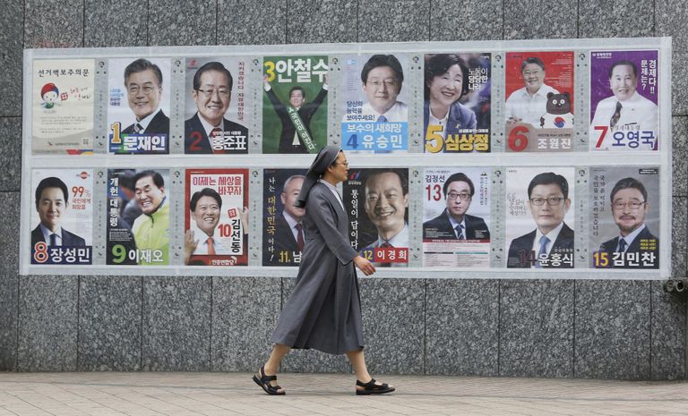 Kandidaatide plakatid. Foto: REUTERS/ Scanpix