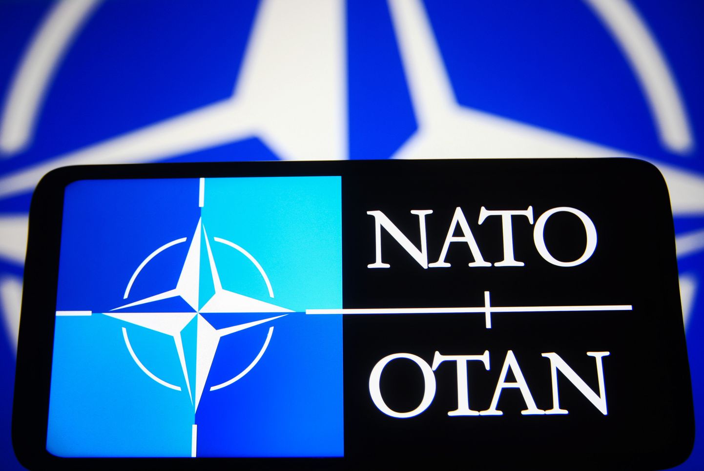 NATO logo.