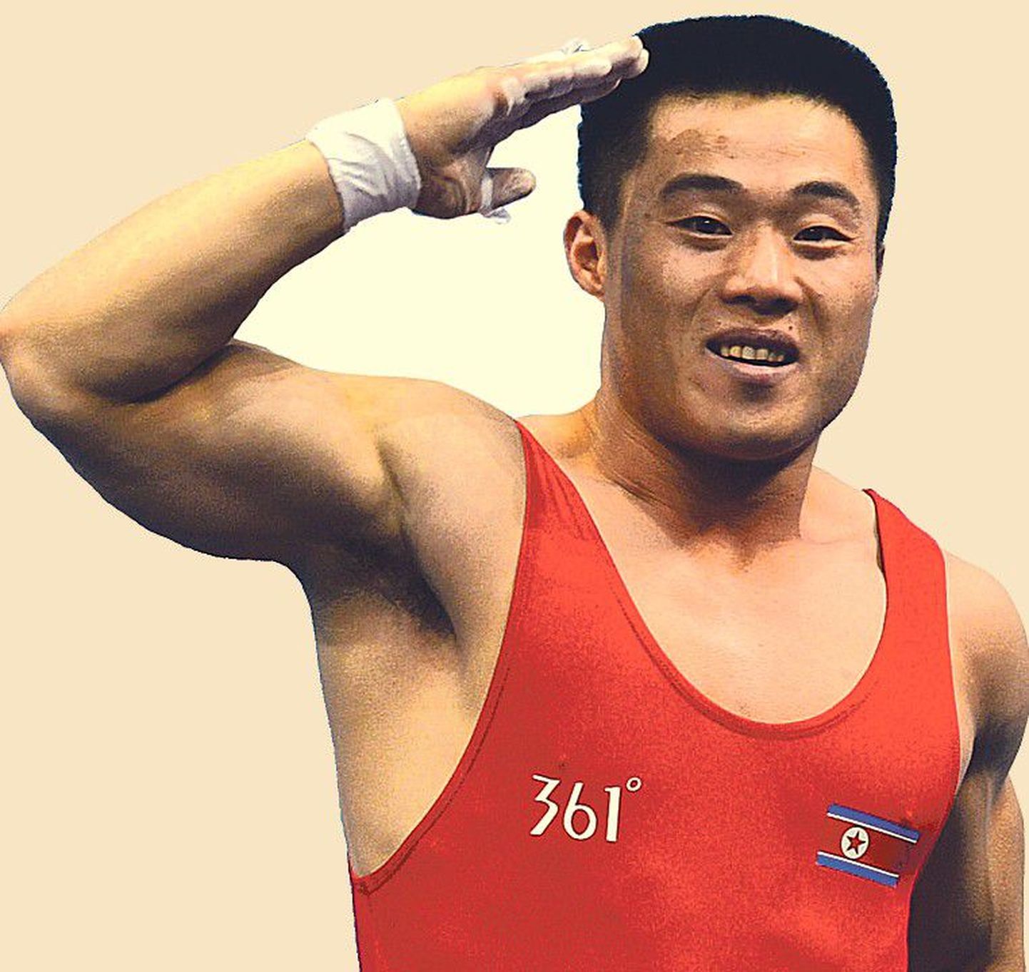 Tõstja Kim Un Guk 
pärast olümpia­võitu au andmas.