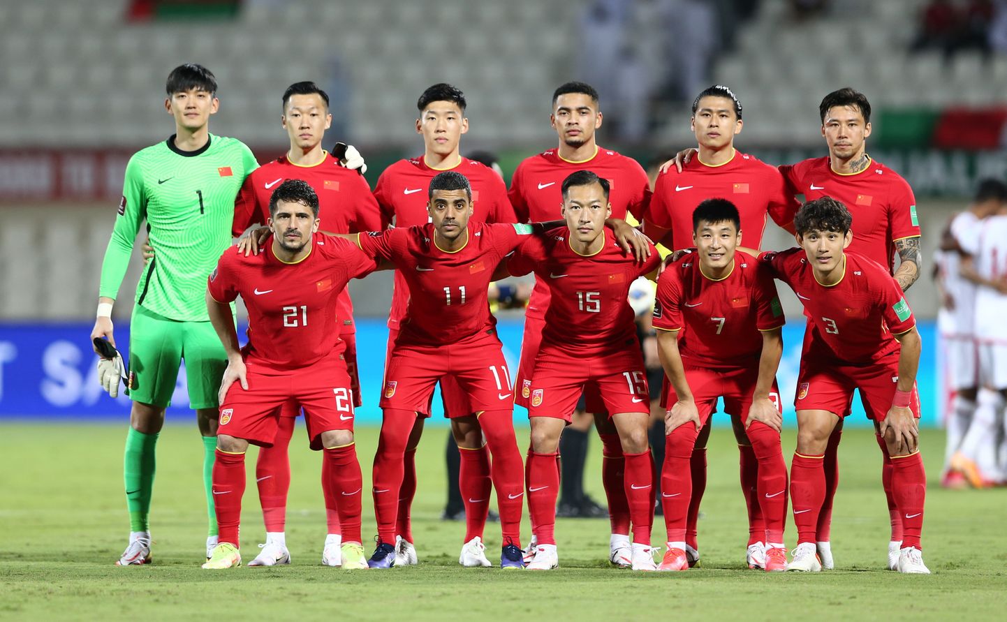 Ķīnas futbola izlases spēlētāji.