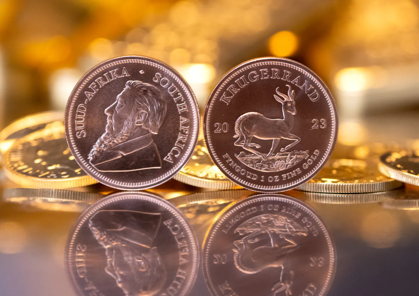 Mullu müüs Tavid 7,4 tonni kulda, millest Eesti osa oli pisut alla kümnendiku. Pildil ka Eesti kullainvestorite seas populaarne Lõuna-Aafrika Vabariigi Krugerrandi kuldmünt.