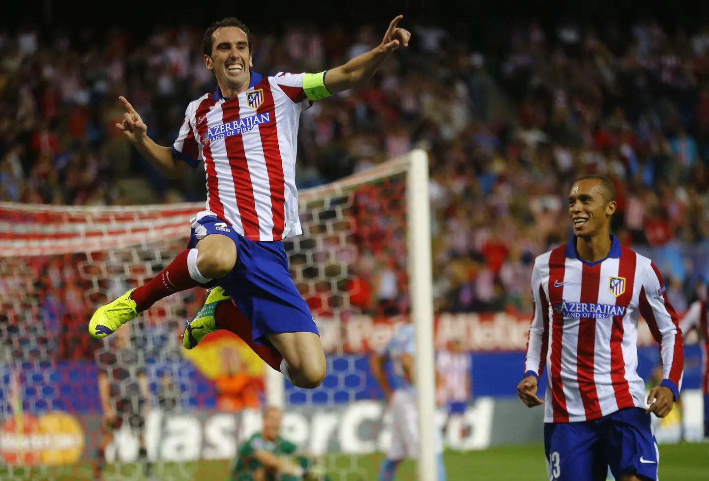 Diego Godin (vasakul) väravat tähistamas.