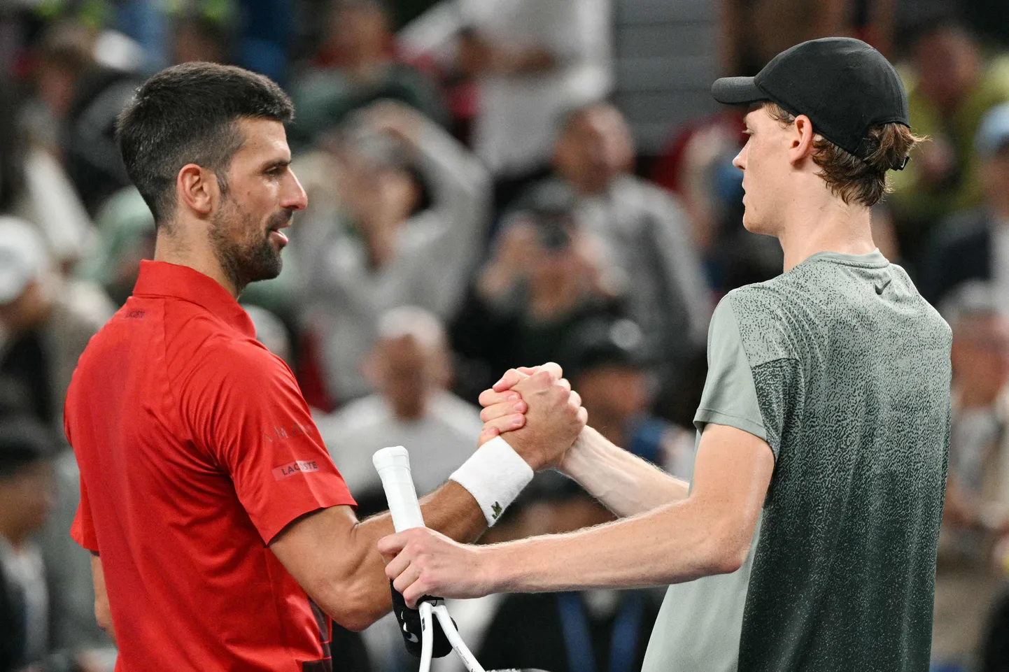 Novak Djokovic (vasakul) ja Jannik Sinner.