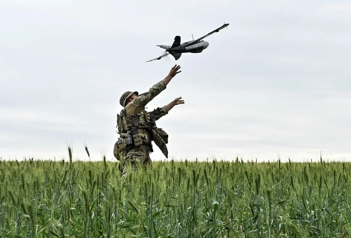 A Ukrainian serviceman launches a reconnaissance drone for flying over positions of Russian troops, amid Russia's attack on Ukraine, in Zaporizhzhia region, Ukraine May 26, 2024.