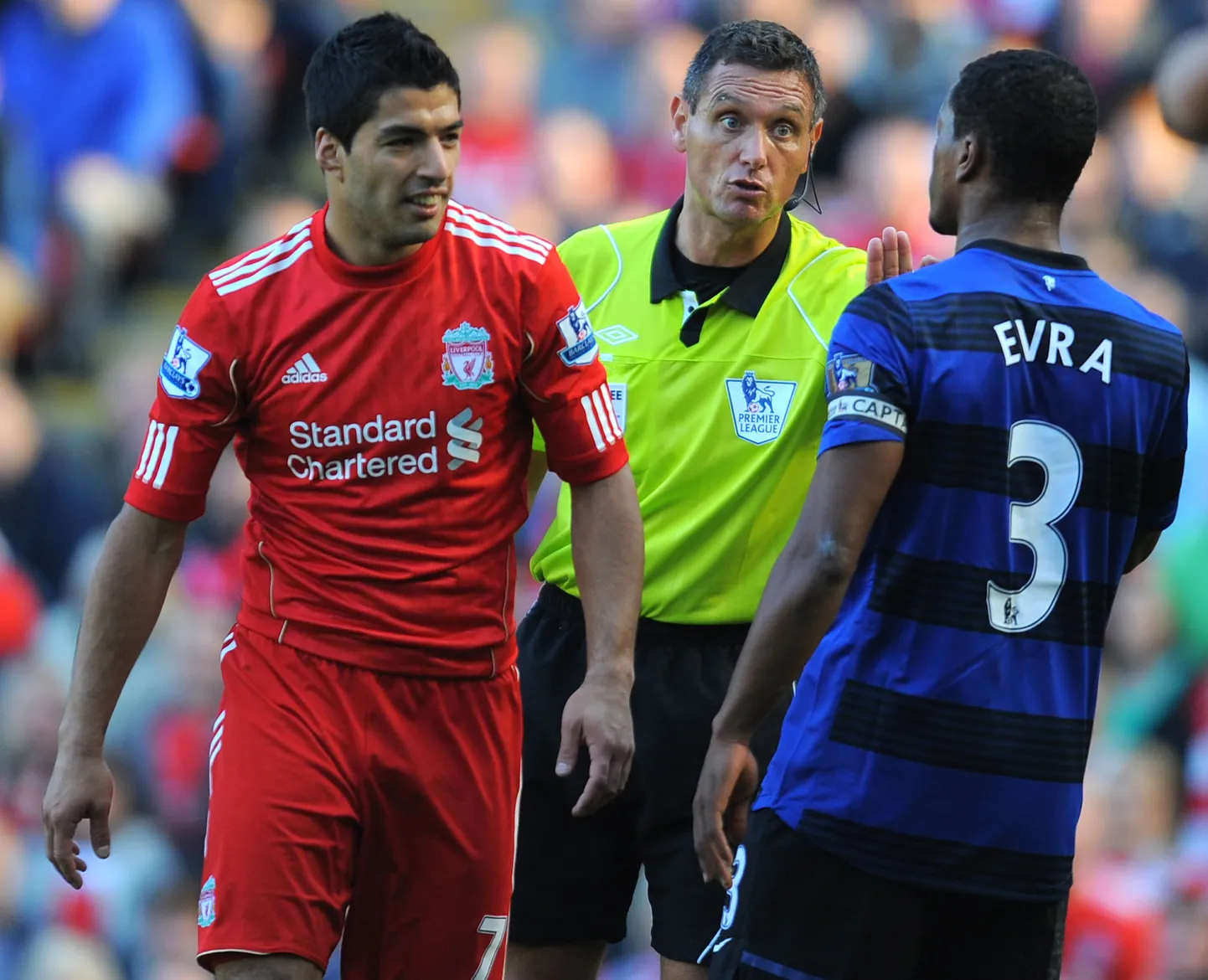 Luis Suárez (vasakul) ja Patrice Evra.