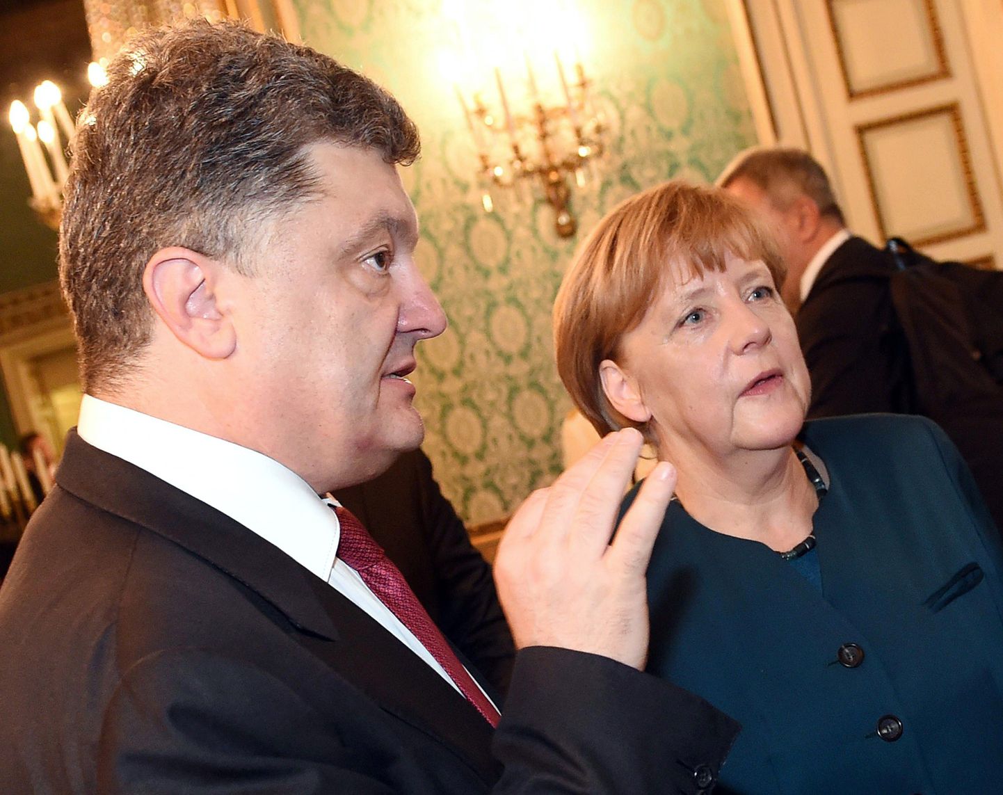 Ukraina president Petro Porošenko koos Saksa kantsleri Angela Merkeliga 17. oktoobril 2014.