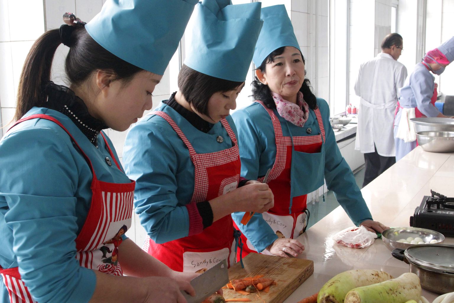 Põhja-Korea toitlustajad Pyongyangis. Foto on illustreeriv.