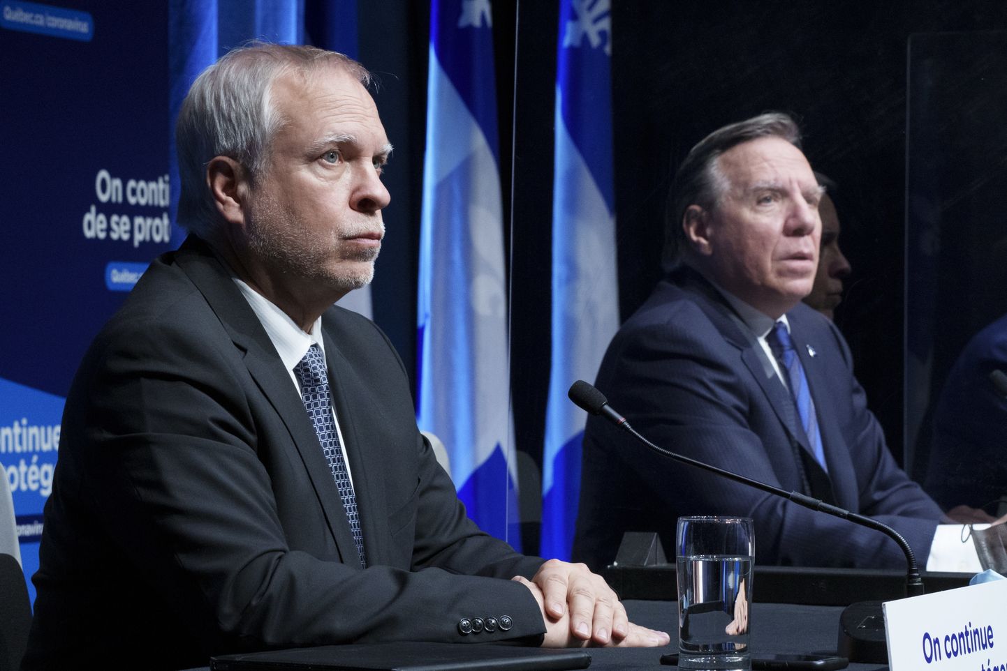 Kanada Québeci provintsi tervisejuhi kohusetäitja Luc Boileau (vasakul) ja peaminister François Legault (paremal) 11. jaanuaril pressikonverentsil.