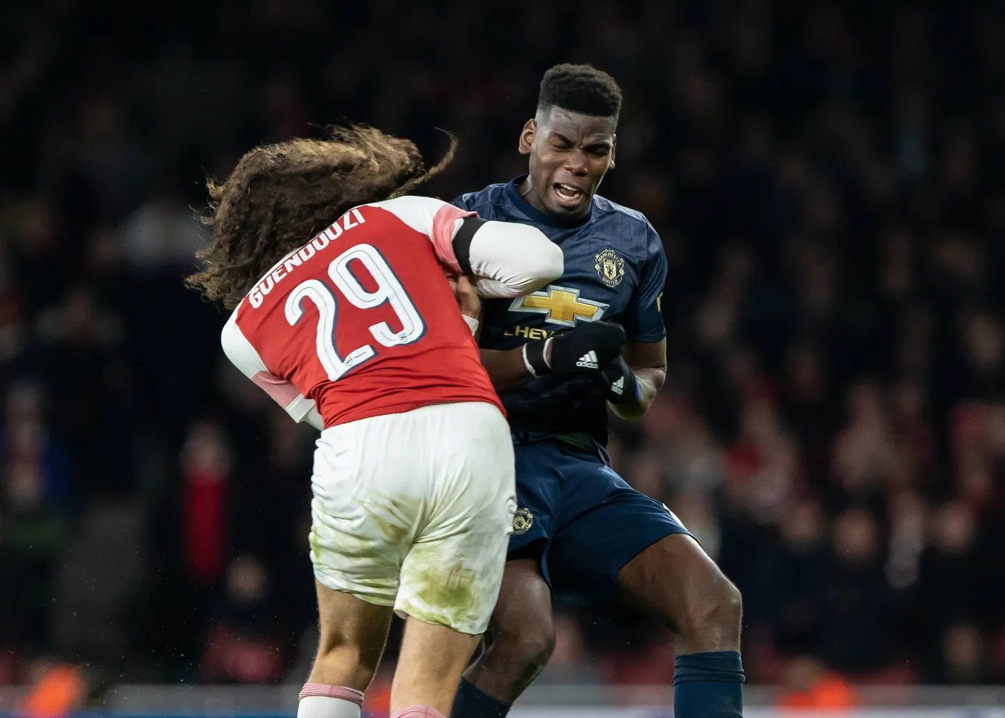 Matteo Guendouzi (number 29) ja Paul Pogba.