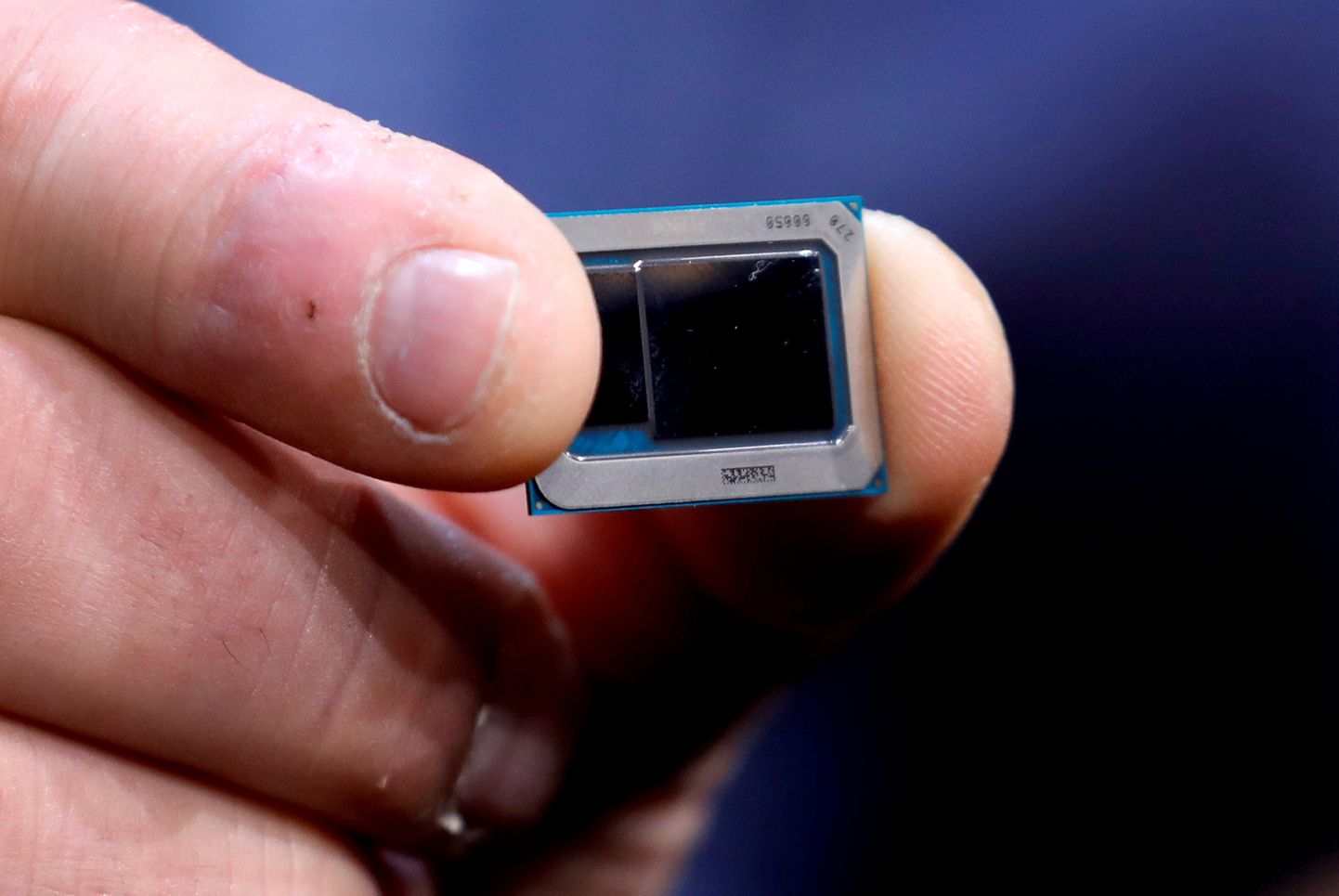 FILE PHOTO: An Intel Tiger Lake chip is displayed at an Intel news conference during the 2020 CES in Las Vegas, Nevada, U.S. January 6, 2020. REUTERS/Steve Marcus/File Photo