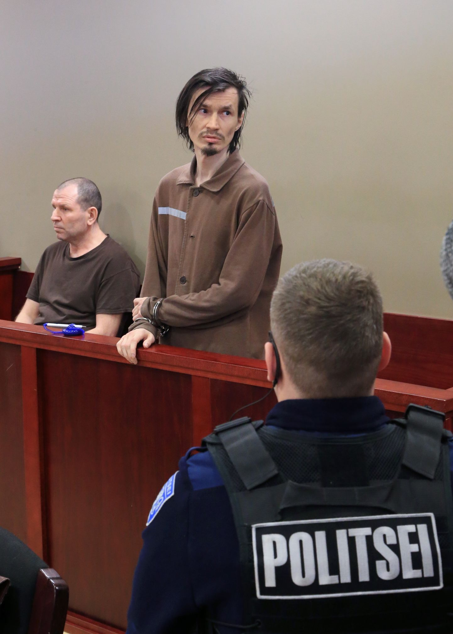 Juri Ustimenko(seisab) ja Nikolai Lilitškin tegelesid eilsel kohtuistungil pidevalt istungil sõnavõttudele vahele segamisega.
