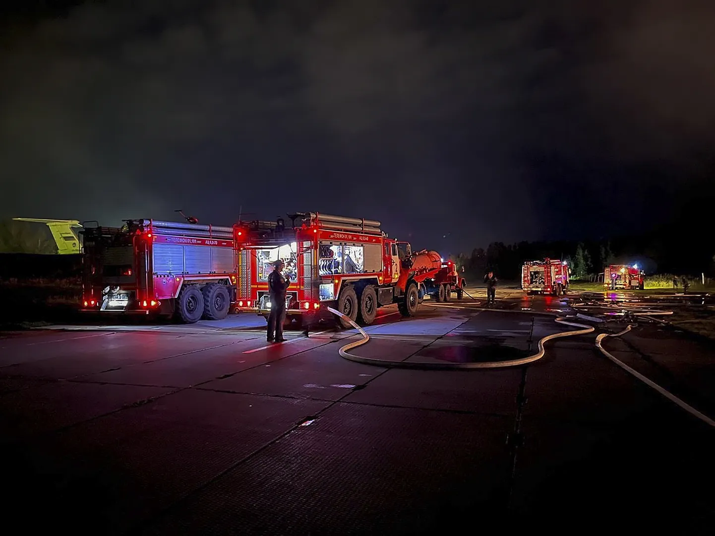 Пожарные после атаки на аэропорт Пскова