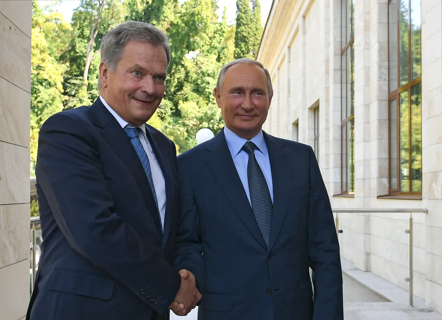 Саули Нийнистё и Владимир Путин.