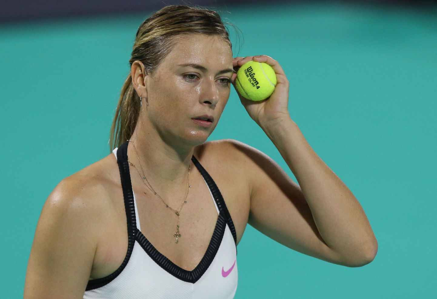 Maria Sharapova of Russia reacts during her match with Ajla Tomljanovic of Australia (unseen) at the Mubadala World Tennis Championship at Zayed Sports City in Abu Dhabi on December 19, 2019. (Photo by - / AFP)