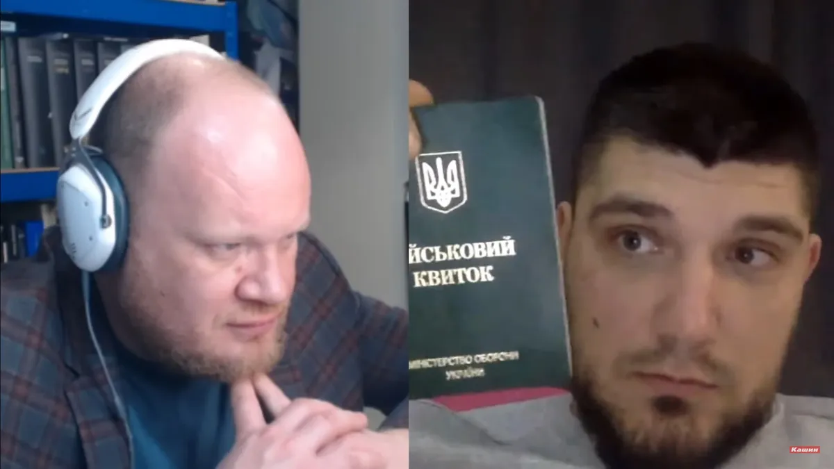Командир «Русского добровольческого корпуса» Денис Никитин демонстрирует свой военный билет бойца ВСУ во время прямого эфира с журналистом Олегом Кашиным, ноябрь 2022 года.