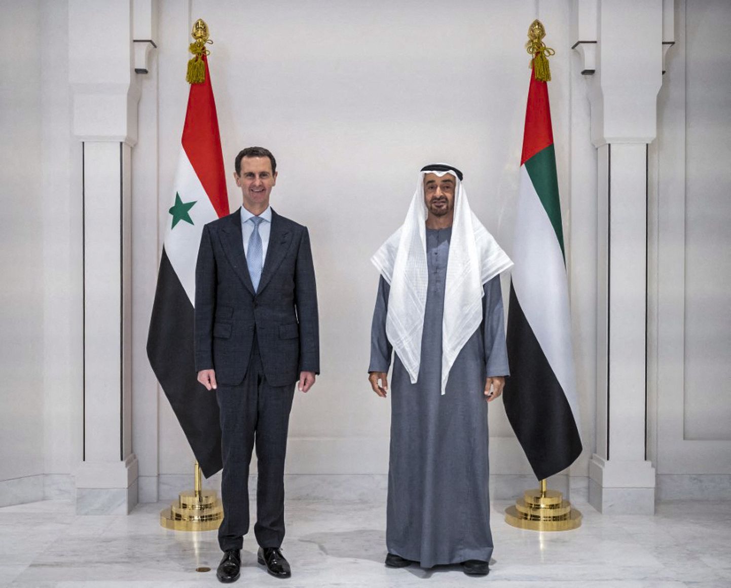 Sīrijas prezidents Bašars al Asads ar AAE šeihu Mohammedu bin Zajedu al Nahjanu.