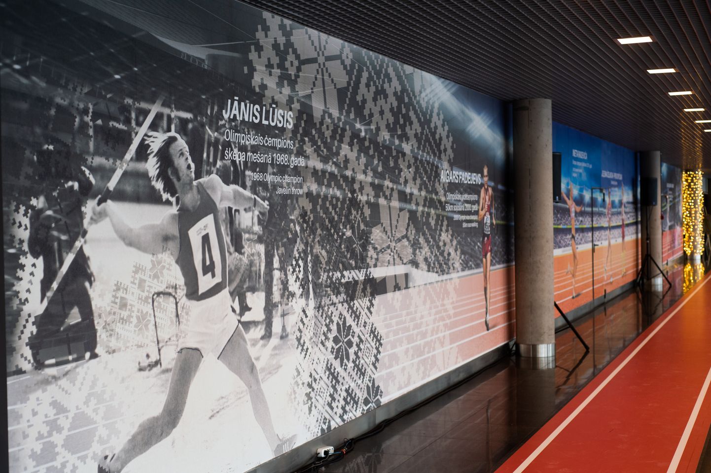 Jānis Lūsis lidostā "Rīga" attēlots uz vieglatlētikas triumfa sienas