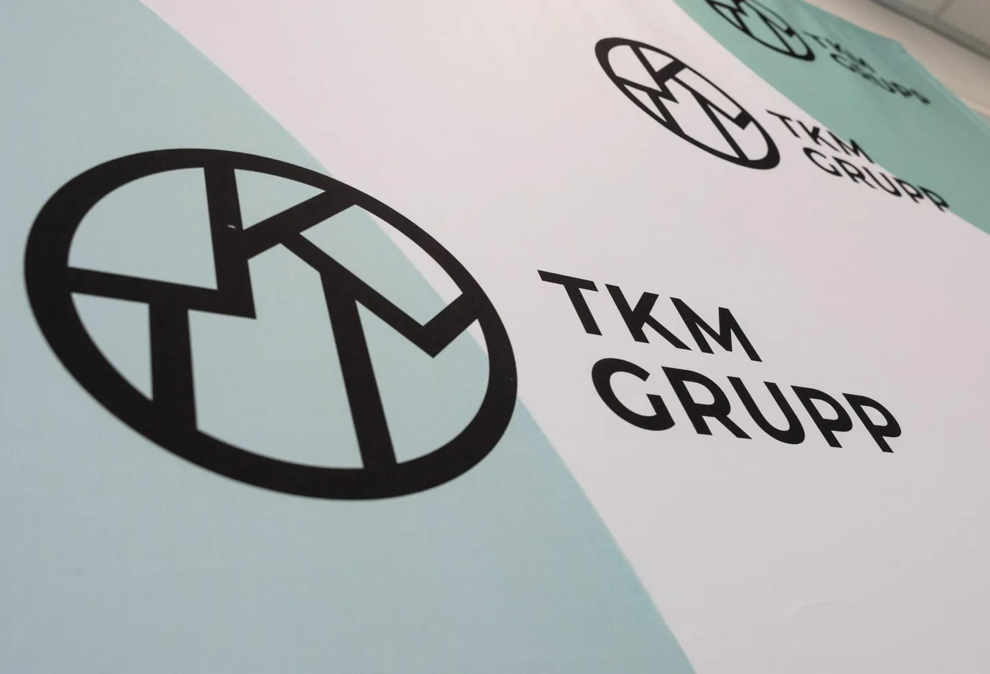 TKM Grupi sümboolika.