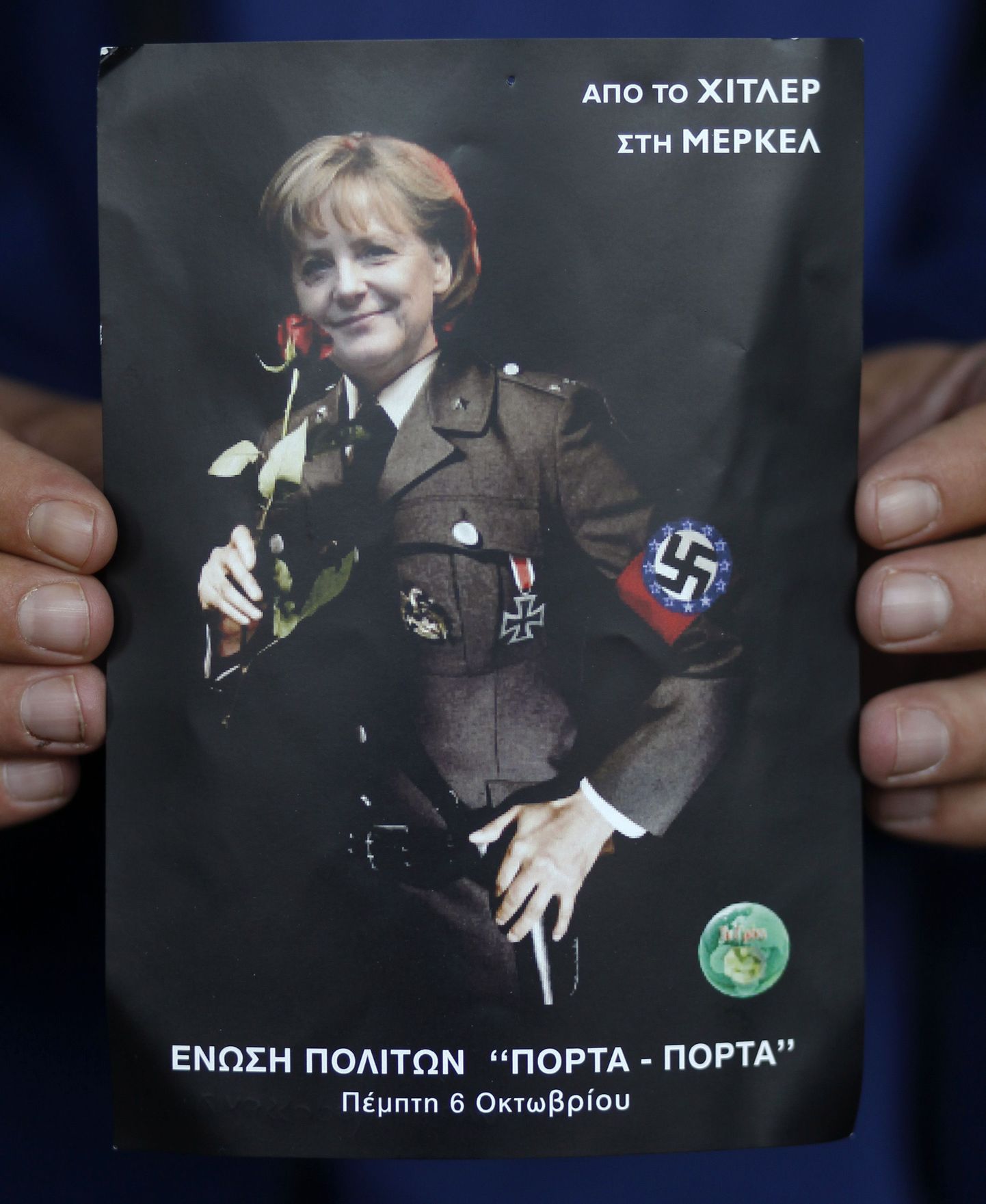 Mullu Ateenas meeleavaldusel kasutatud plakat, millel Saksa kantslerit kujutati natsimundris. Merkelist on Kreeka demonstratsioonidel saanud suurim vihaobjekt.