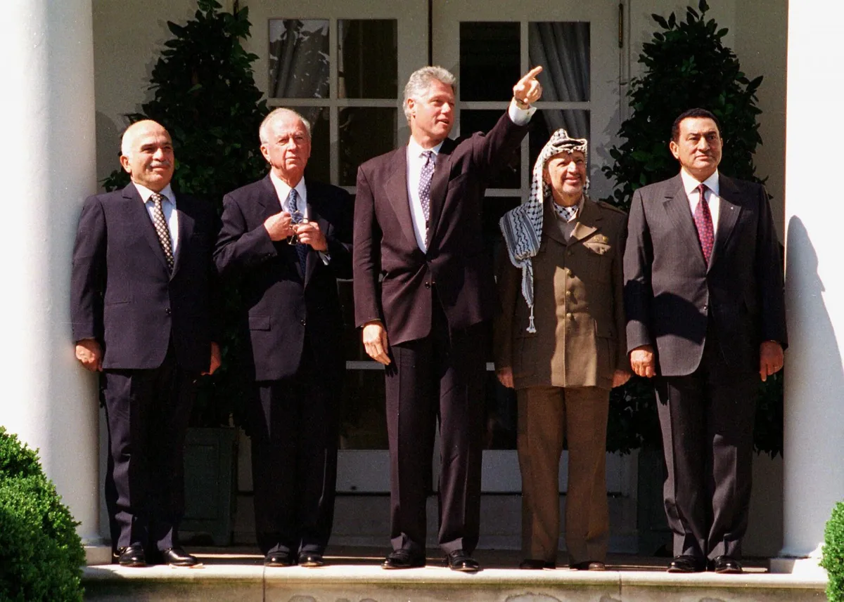 One hopeful moment for resolving the Israeli-Palestinian conflict was the signing of the Oslo Accords mediated by U.S. President Bill Clinton on September 28, 1995. Pictured (from left) are Jordan's King Hussein, Israeli Prime Minister Yitzhak Rabin, U.S. President Bill Clinton, Palestinian Authority leader Yasser Arafat, and Egyptian President Hosni Mubarak.