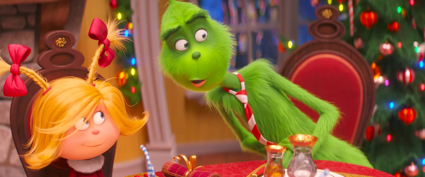 FILE - This file image released by Universal Pictures shows the characters Cindy-Lou Who, voiced by Cameron Seely, left, and Grinch, voiced by Benedict Cumberbatch, in a scene from "The Grinch." ‚ÄúDr. Seuss‚Äô The Grinch‚Äù made off with $66 million for Universal Pictures to top the weekend North American box office, according to studio estimates Sunday, Nov 11, 2018. (Universal Pictures via AP, File)
