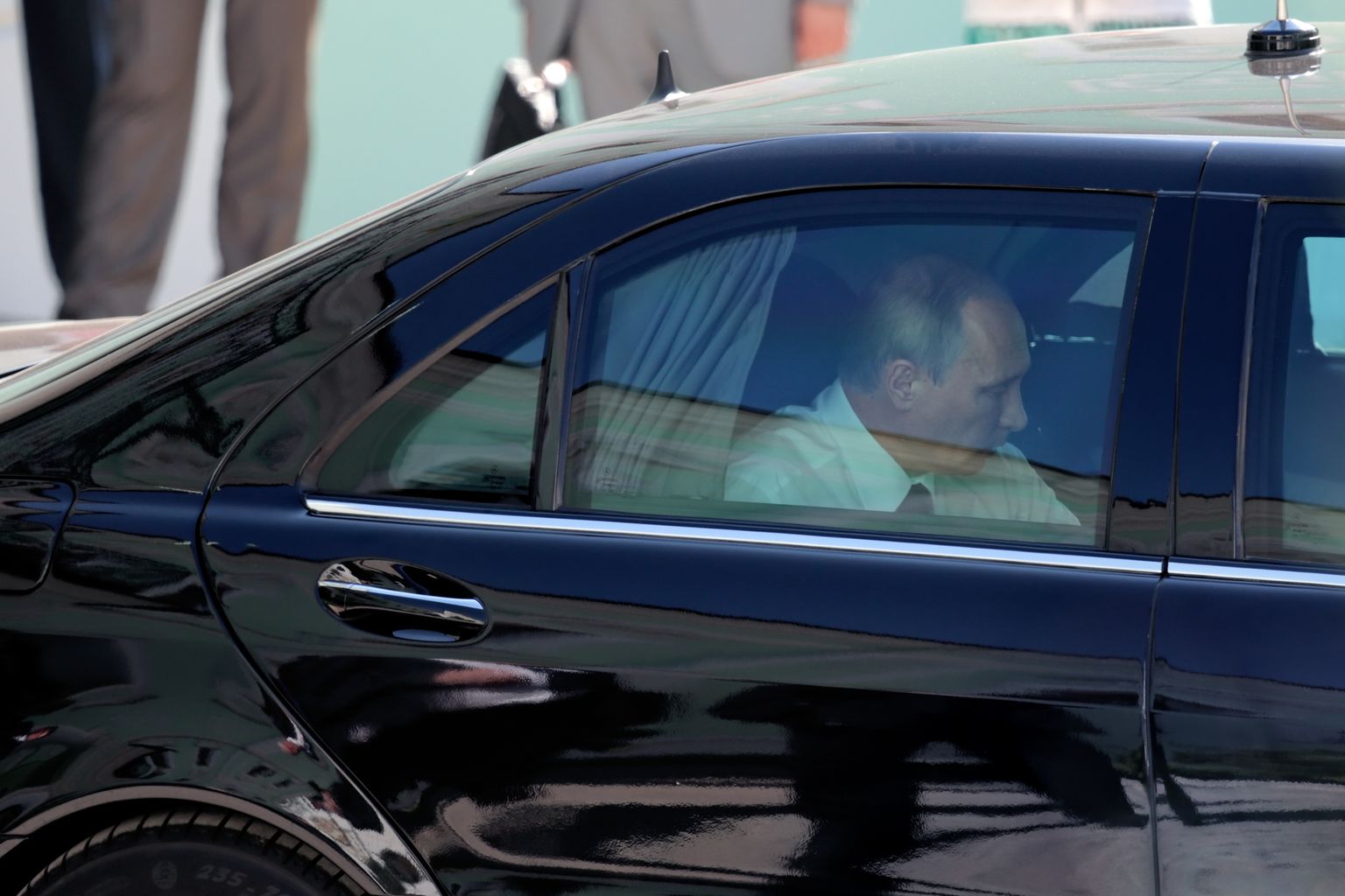 Владимир Путин в автомобиле. Иллюстративное фото