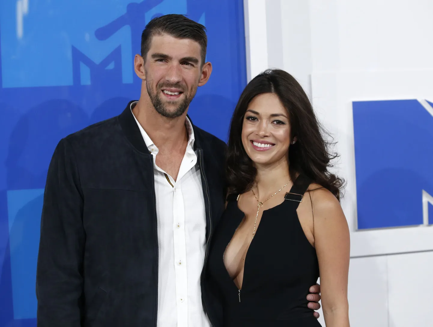 Michael Phelps ja Nicole Johnson.