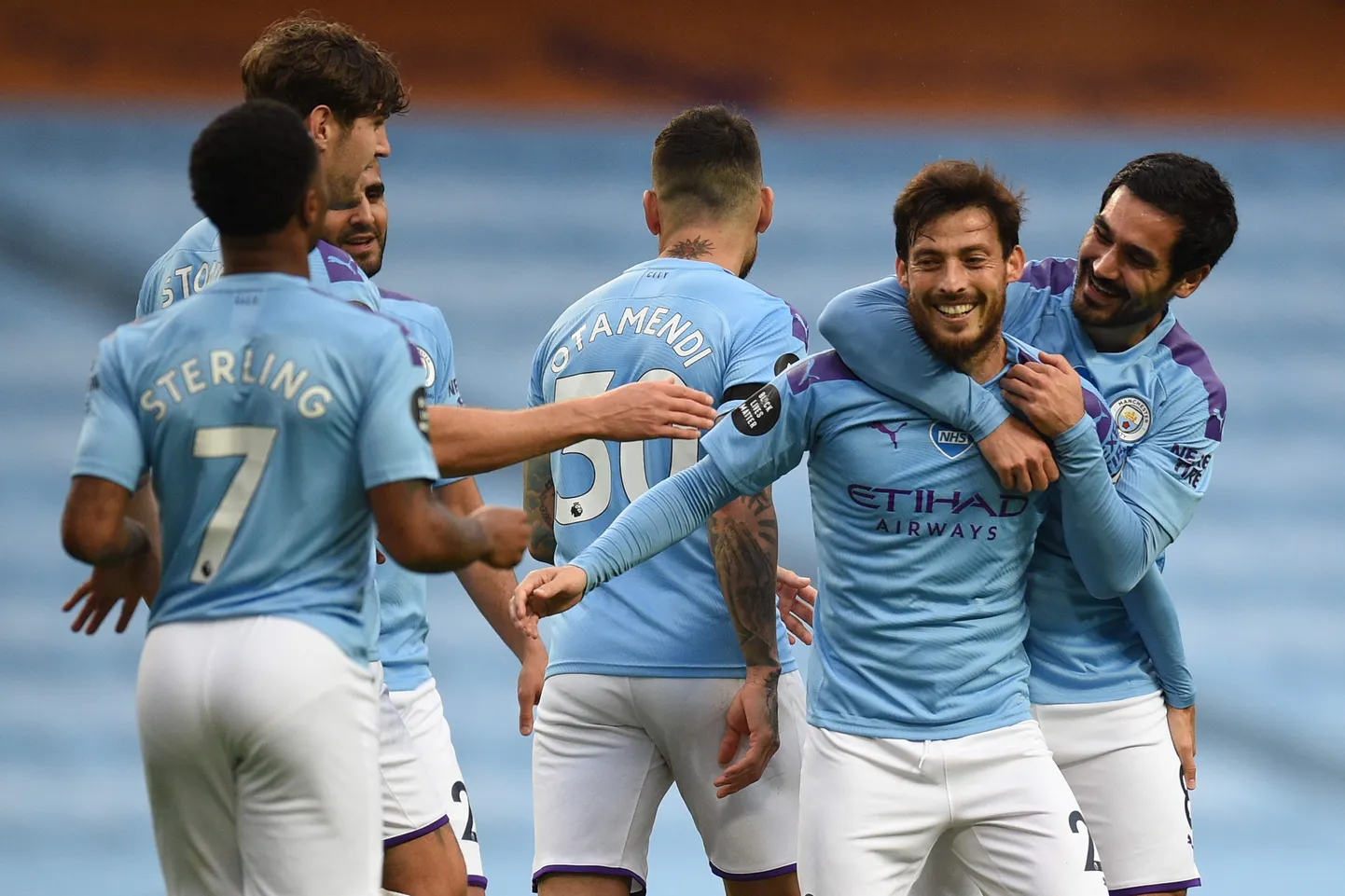 Manchester City mängijad väravat tähistamas.
