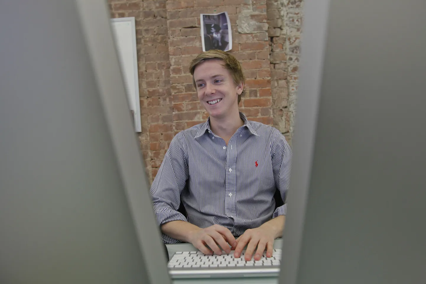 Chris Hughes, one of the founders of Facebook at his desk in the offices of Jumo in New York, Nov. 24, 2010.