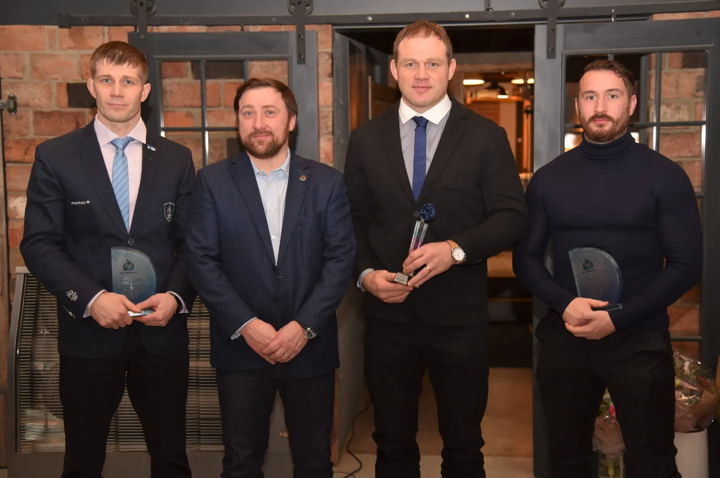 Vasakult: Ivar Kotkas, EMLi asepresident Tanel Samuel, Heiki Nabi, Levi Earl.