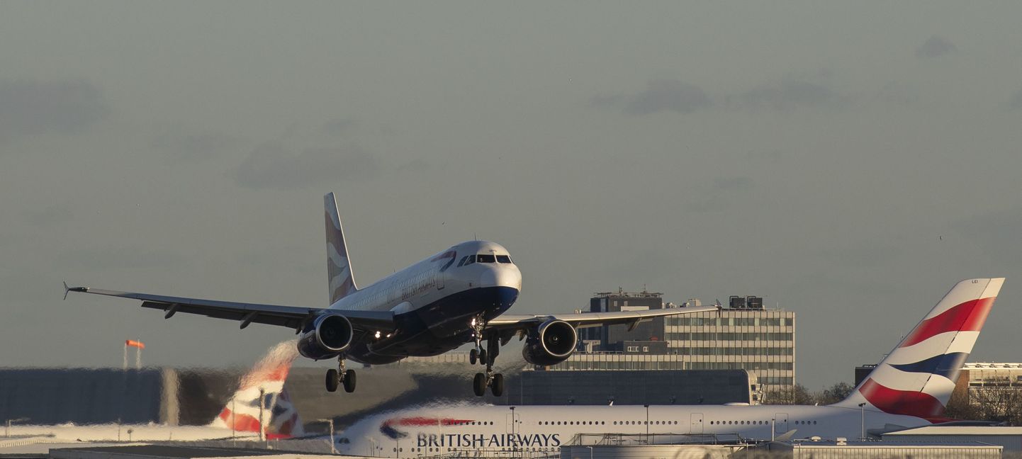 A British Airways plane lands at Heathrow Airport, west London.