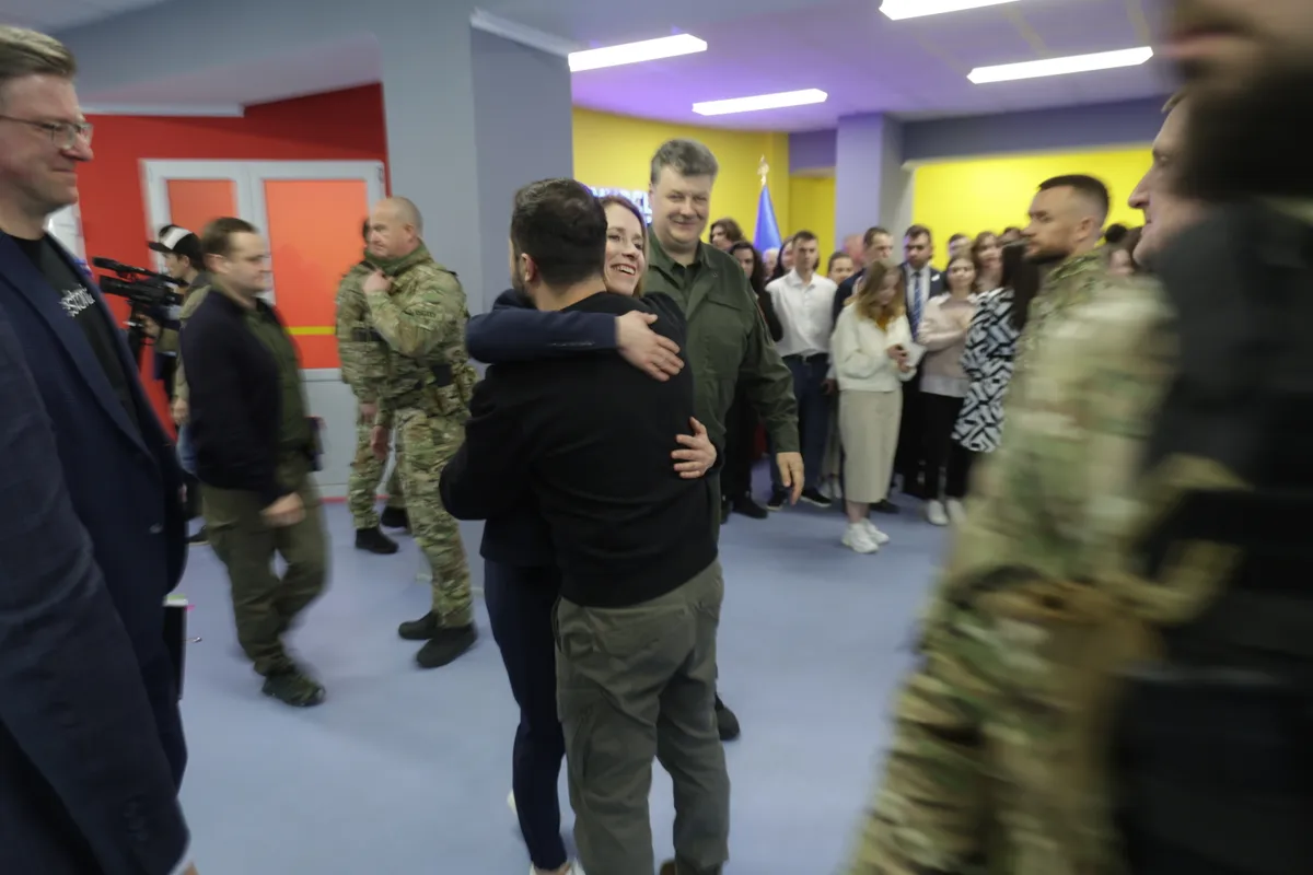 Estonian Prime Minister Kaja Kallas greets Ukrainian President Volodymyr Zelenskyy.