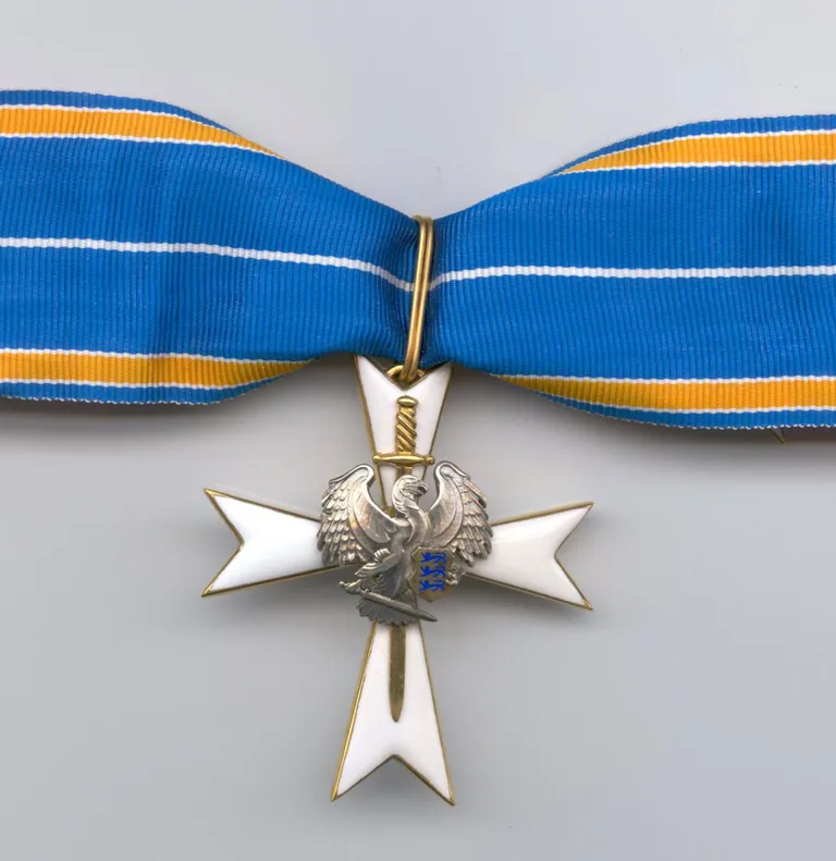 Kaitseliidu Valgeristi I klassi teenetemärk.