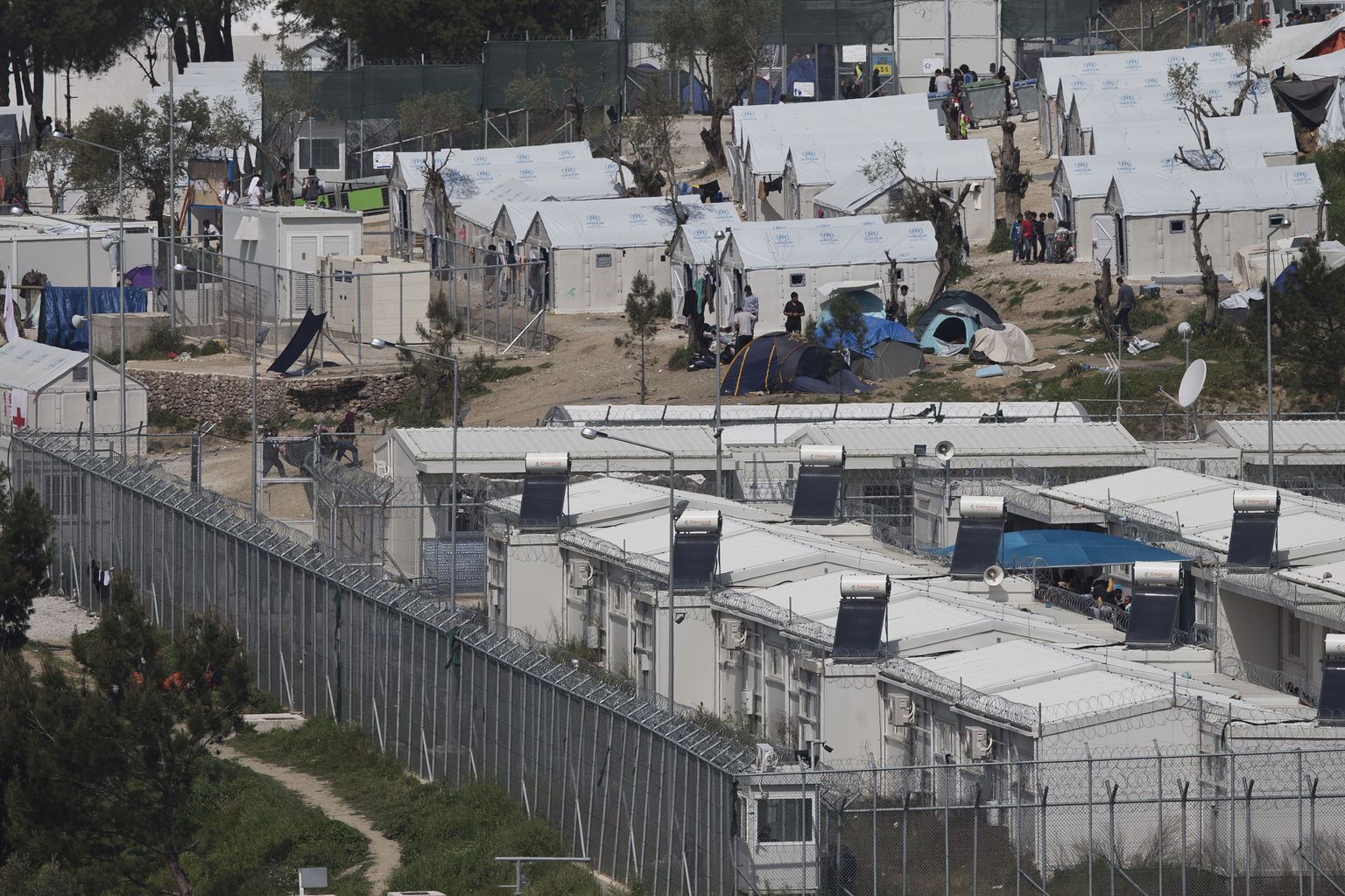 Migrandid Moria põgenikelaagris Kreekas Lesbose saarel.