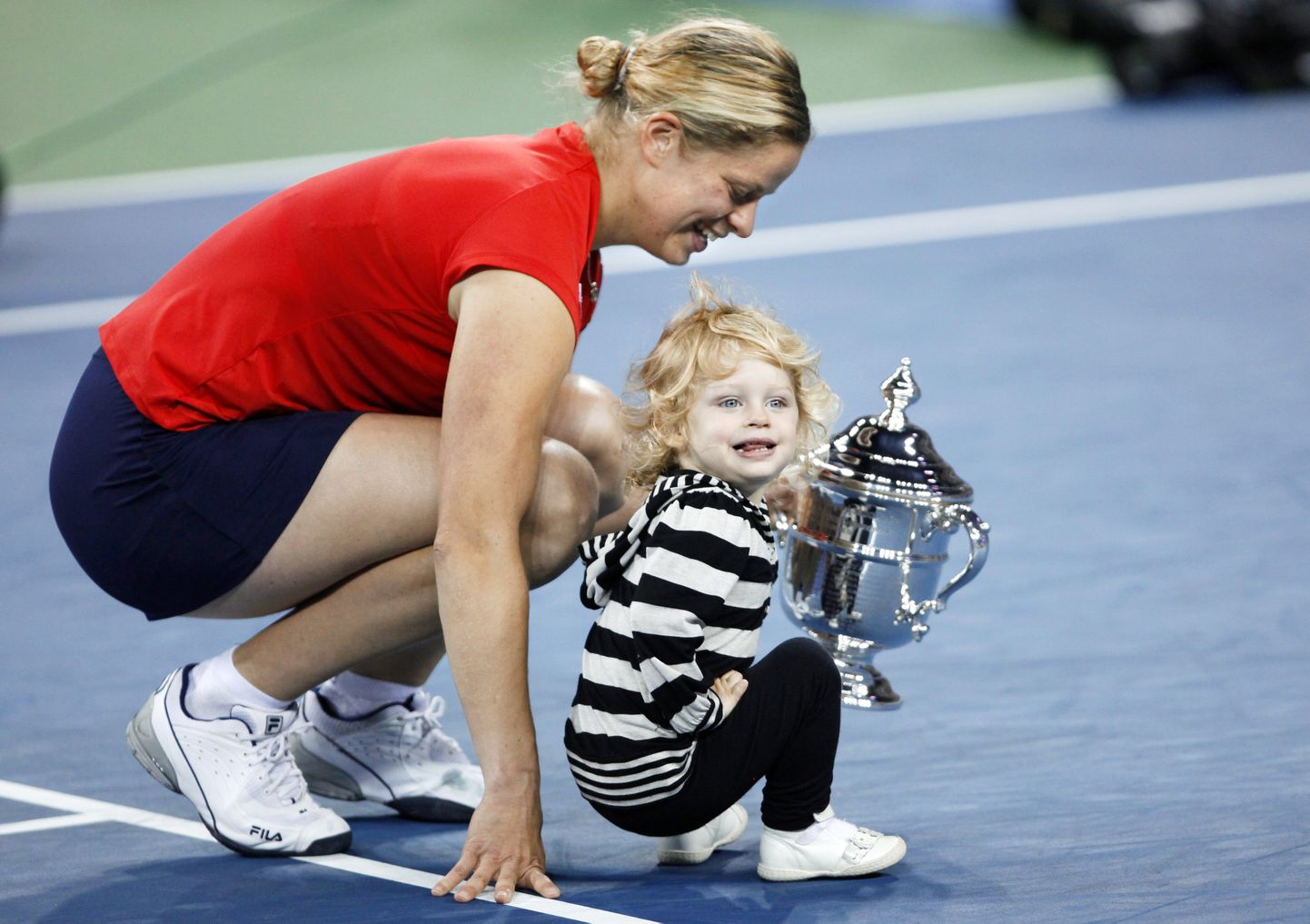 Kim Clijsters koos tütre Jadaga pärast US Openi tenniseturniiri võitu 2009. aastal.