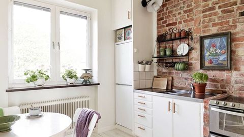 Фото: кирпичная стена в интерьере кухни